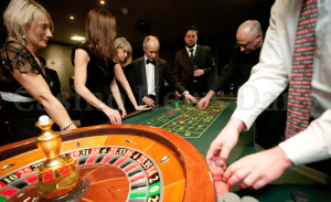 woman betting on red in roulette